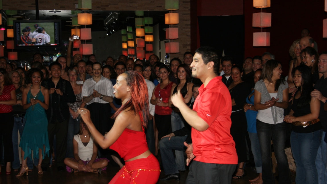 Latin/salsa dancers in red